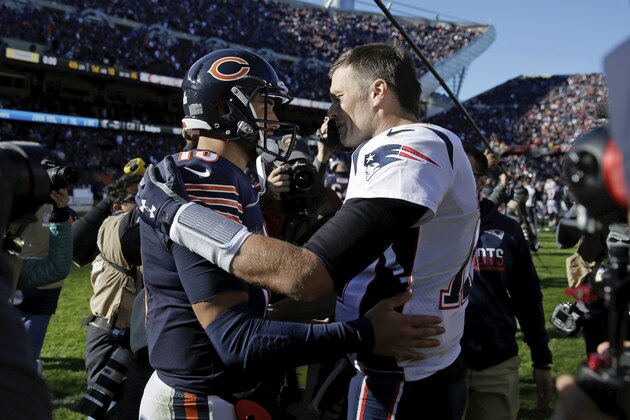 Chicago Bears quarterback Mitchell Trubisky (10) and New England Patriots quarterback Tom Brady (12) greet each other after an NFL football game Sunday, Oct. 21, 2018, in Chicago. The Patriots won 38-31.(AP Photo/David Banks)