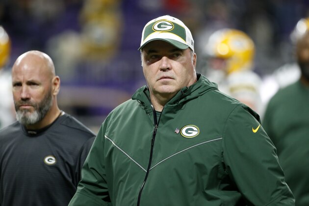 Green Bay Packers head coach Mike McCarthy walks on the field before an NFL football game against the Minnesota Vikings, Sunday, Nov. 25, 2018, in Minneapolis. (AP Photo/Bruce Kluckhohn)