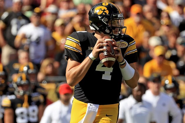 TAMPA, FL - JANUARY 01:  Nate Stanley #4 of the Iowa Hawkeyes passes during the 2019 Outback Bowl against the Mississippi State Bulldogs at Raymond James Stadium on January 1, 2019 in Tampa, Florida.  (Photo by Mike Ehrmann/Getty Images)