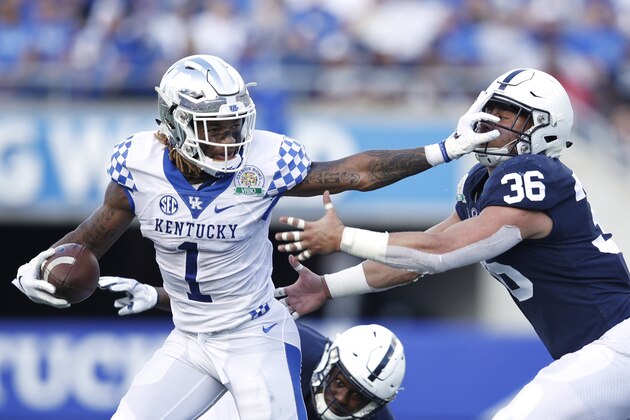 ORLANDO, FL - JANUARY 01: Lynn Bowden Jr. #1 of the Kentucky Wildcats runs for a first down after catching a pass against Jan Johnson #36 of the Penn State Nittany Lions in the third quarter of the VRBO Citrus Bowl at Camping World Stadium on January 1, 2019 in Orlando, Florida. (Photo by Joe Robbins/Getty Images)