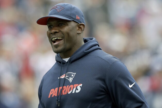 New England Patriots linebackers coach Brian Flores watches his team warm up before an NFL football game against the Houston Texans, Sunday, Sept. 9, 2018, in Foxborough, Mass. (AP Photo/Charles Krupa)