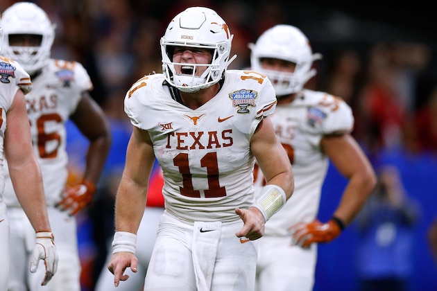 NEW ORLEANS, LOUISIANA - JANUARY 01: Sam Ehlinger #11 of the Texas Longhorns celebrates a touchdown during the second half of the Allstate Sugar Bowl against the Georgia Bulldogs at the Mercedes-Benz Superdome on January 01, 2019 in New Orleans, Louisiana. (Photo by Jonathan Bachman/Getty Images)