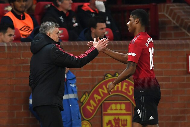 Manchester United's English striker Marcus Rashford (R) shakes hands with Manchester United's Norwegian caretaker manager Ole Gunnar Solskjaer (L) after being substituted during the English Premier League football match between Manchester United and Bournemouth at Old Trafford in Manchester, north west England, on December 30, 2018. (Photo by Paul ELLIS / AFP) / RESTRICTED TO EDITORIAL USE. No use with unauthorized audio, video, data, fixture lists, club/league logos or 'live' services. Online in-match use limited to 120 images. An additional 40 images may be used in extra time. No video emulation. Social media in-match use limited to 120 images. An additional 40 images may be used in extra time. No use in betting publications, games or single club/league/player publications. / (Photo credit should read PAUL ELLIS/AFP/Getty Images) Manchester United's English striker Marcus Rashford (R) shakes hands with Manchester United's Norwegian caretaker manager Ole Gunnar Solskjaer (L) after being substituted during the English Premier League football match between Manchester United and Bournemouth at Old Trafford in Manchester, north west England, on December 30, 2018. (Photo by Paul ELLIS / AFP) / RESTRICTED TO EDITORIAL USE. No use with unauthorized audio, video, data, fixture lists, club/league logos or 'live' services. Online in-match use limited to 120 images. An additional 40 images may be used in extra time. No video emulation. Social media in-match use limited to 120 images. An additional 40 images may be used in extra time. No use in betting publications, games or single club/league/player publications. / (Photo credit should read PAUL ELLIS/AFP/Getty Images)
