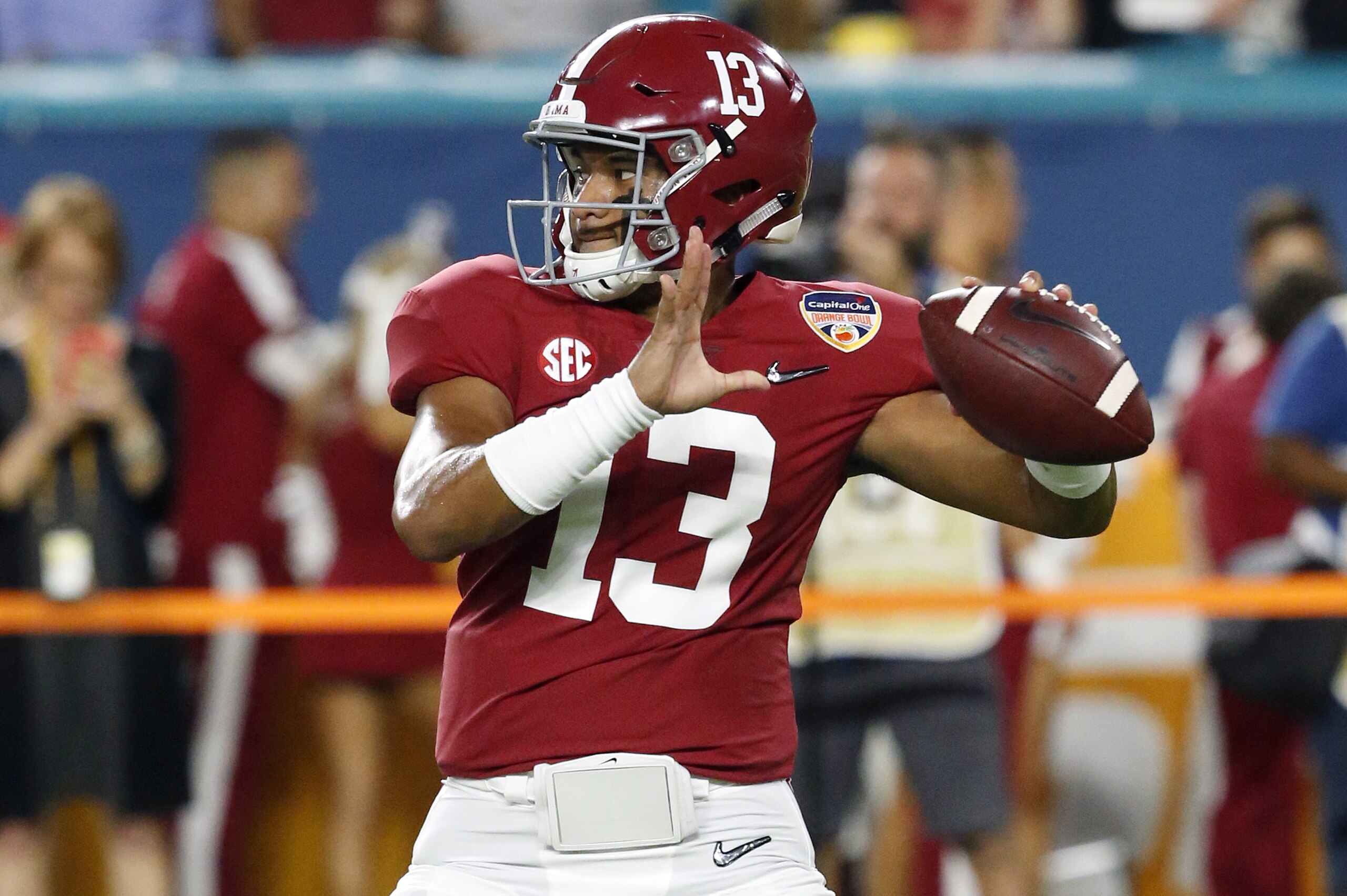 MIAMI GARDENS, FL - DECEMBER 29: Tua Tagovailoa #13 of the Alabama Crimson Tide throws the ball prior to the College Football Playoff Semifinal at the Capital One Orange Bowl against the Oklahoma Sooners at Hard Rock Stadium on December 29, 2018 in Miami Gardens, Florida. Alabama defeated Oklahoma 45-34. (Photo by Joel Auerbach/Getty Images) MIAMI GARDENS, FL - DECEMBER 29: Tua Tagovailoa #13 of the Alabama Crimson Tide throws the ball prior to the College Football Playoff Semifinal at the Capital One Orange Bowl against the Oklahoma Sooners at Hard Rock Stadium on December 29, 2018 in Miami Gardens, Florida. Alabama defeated Oklahoma 45-34. (Photo by Joel Auerbach/Getty Images)