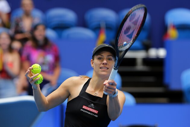 PERTH, AUSTRALIA - JANUARY 02:  Angelique Kerber of Germany hits signed tennis balls into the crowd after defeating Alize Cornet of France in the women's singles match during day five of the 2019 Hopman Cup at Perth Arena on January 02, 2019 in Perth, Australia. (Photo by Will Russell/Getty Images)