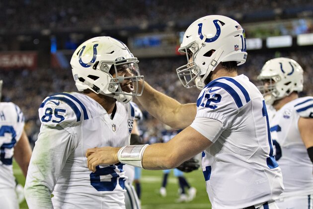 NASHVILLE, TN - DECEMBER 30:  Andrew Luck #12 congratulates Eric Ebron #85 of the Indianapolis Colts after catching a pass for a touchdown during a game against the Tennessee Titans at Nissan Stadium on December 30, 2018 in Nashville, Tennessee.  The Colts defeated the Titans 33-17.   (Photo by Wesley Hitt/Getty Images)