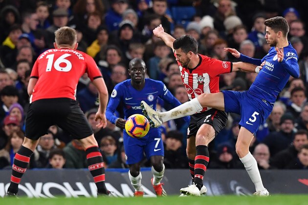 Chelsea's Italian midfielder Jorginho (R) vies with Southampton's Irish striker Shane Long (2nd R) during the English Premier League football match between Chelsea and Southampton at Stamford Bridge in London on January 2, 2019. (Photo by Ben STANSALL / AFP) / RESTRICTED TO EDITORIAL USE. No use with unauthorized audio, video, data, fixture lists, club/league logos or 'live' services. Online in-match use limited to 120 images. An additional 40 images may be used in extra time. No video emulation. Social media in-match use limited to 120 images. An additional 40 images may be used in extra time. No use in betting publications, games or single club/league/player publications. /         (Photo credit should read BEN STANSALL/AFP/Getty Images)