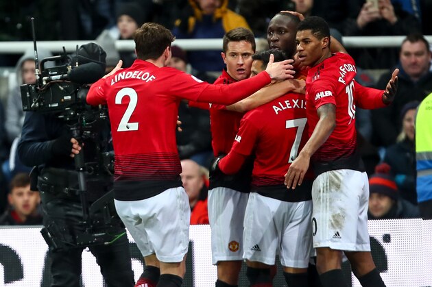 NEWCASTLE UPON TYNE, ENGLAND - JANUARY 02: Romelu Lukaku of Manchester United celebrates after scoring a goal to make it 0-1 during the Premier League match between Newcastle United and Manchester United at St. James Park on January 2, 2019 in Newcastle upon Tyne, United Kingdom. (Photo by Robbie Jay Barratt - AMA/Getty Images)