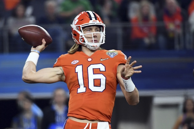 Clemson quarterback Trevor Lawrence (16) throws a pass in the first half of the NCAA Cotton Bowl semi-final playoff football game against Notre Dame on Saturday, Dec. 29, 2018, in Arlington, Texas. (AP Photo/Jeffrey McWhorter)