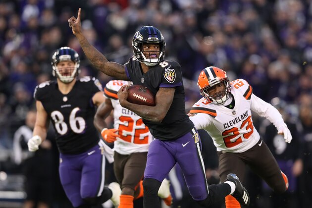BALTIMORE, MARYLAND - DECEMBER 30: Quarterback Lamar Jackson #8 of the Baltimore Ravens runs for a touchdown in the first quarter against the Cleveland Browns at M&T Bank Stadium on December 30, 2018 in Baltimore, Maryland. (Photo by Rob Carr/Getty Images)