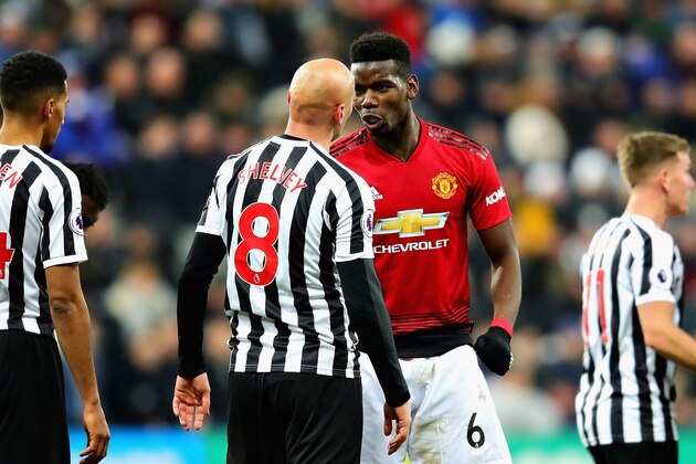 NEWCASTLE UPON TYNE, ENGLAND - JANUARY 02:  Paul Pogba of Manchester United talks with Jonjo Shelvey of Newcastle United after a challenge during the Premier League match between Newcastle United and Manchester United at St. James Park on January 2, 2019 in Newcastle upon Tyne, United Kingdom.  (Photo by Chris Brunskill/Fantasista/Getty Images)