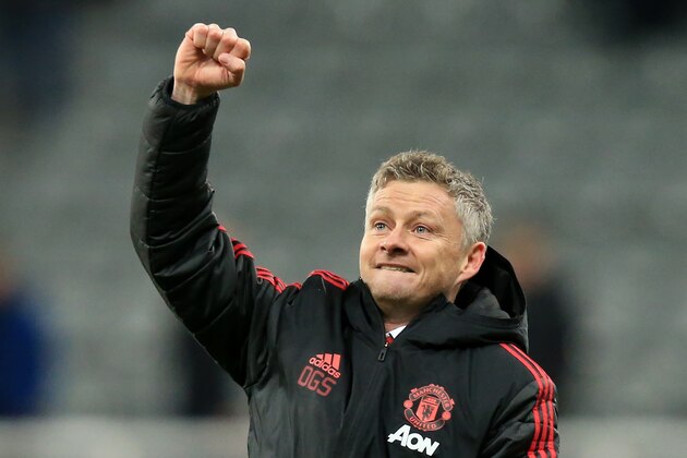 Manchester United's  Norwegian caretaker manager Ole Gunnar Solskjaer applauds the fans following the English Premier League football match between Newcastle United and Manchester United at St James' Park in Newcastle-upon-Tyne, north east England on January 2, 2019. - Manchester United won the match 2-0. (Photo by Lindsey PARNABY / AFP) / RESTRICTED TO EDITORIAL USE. No use with unauthorized audio, video, data, fixture lists, club/league logos or 'live' services. Online in-match use limited to 120 images. An additional 40 images may be used in extra time. No video emulation. Social media in-match use limited to 120 images. An additional 40 images may be used in extra time. No use in betting publications, games or single club/league/player publications. /         (Photo credit should read LINDSEY PARNABY/AFP/Getty Images)