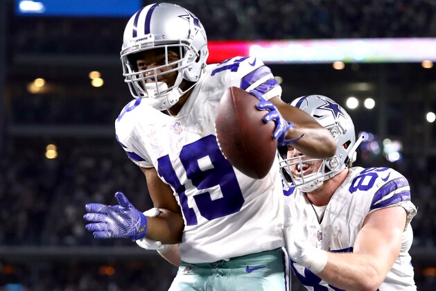 ARLINGTON, TEXAS - DECEMBER 09:  Amari Cooper #19 of the Dallas Cowboys celebrates with Blake Jarwin #89 after a touchdown against the Philadelphia Eagles in overtime for a 29-23 win at AT&T Stadium on December 09, 2018 in Arlington, Texas. (Photo by Ronald Martinez/Getty Images)