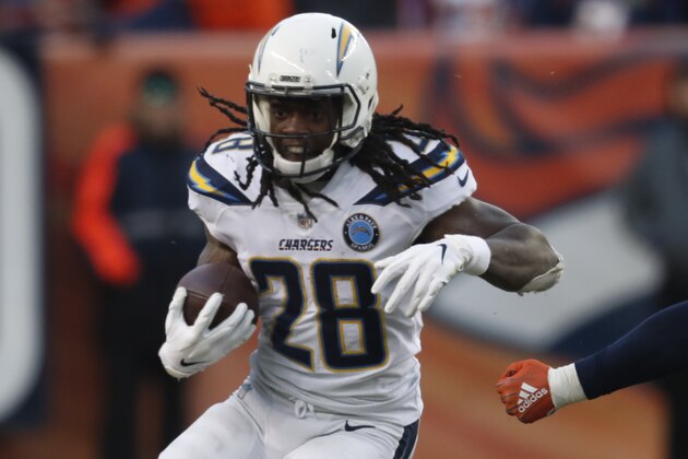 Los Angeles Chargers running back Melvin Gordon rushes during the second half of an NFL football game against the Denver Broncos, Sunday, Dec. 30, 2018, in Denver. (AP Photo/David Zalubowski)