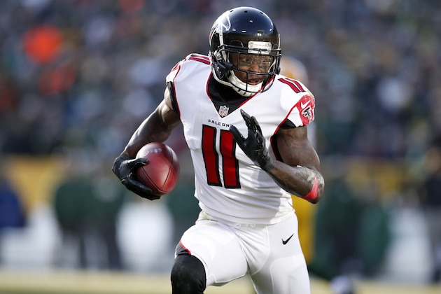 Atlanta Falcons wide receiver Julio Jones (11) runs with the ball after a catch for a touchdown against the Green Bay Packers during an NFL football game Sunday, Dec. 9, 2018, in Green Bay, Wis. The Packers won 34-20. (Jeff Haynes/AP Images for Panini)