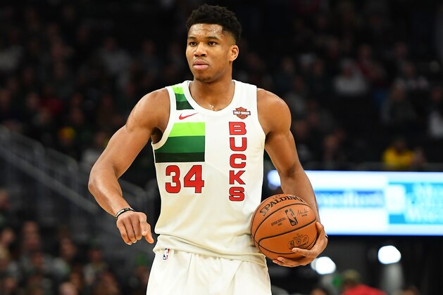 MILWAUKEE, WISCONSIN - DECEMBER 29:  Giannis Antetokounmpo #34 of the Milwaukee Bucks handles the ball during a game against the Brooklyn Nets at Fiserv Forum on December 29, 2018 in Milwaukee, Wisconsin.  NOTE TO USER: User expressly acknowledges and agrees that, by downloading and or using this photograph, User is consenting to the terms and conditions of the Getty Images License Agreement. (Photo by Stacy Revere/Getty Images)