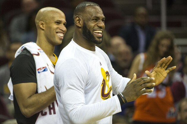 Cleveland Cavaliers' LeBron James (23) and teammate Richard Jefferson react during a basketball game against the New York Knicks in Cleveland, Tuesday, Oct. 25, 2016. (AP Photo/Phil Long)