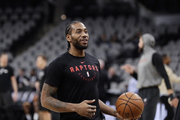 Toronto Raptors forward Kawhi Leonard, playing in his first game against the San Antonio Spurs since he was traded, warms up before an NBA basketball game, Thursday, Jan. 3, 2019, in San Antonio. (AP Photo/Eric Gay)