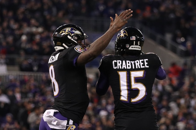 BALTIMORE, MARYLAND - DECEMBER 30: Quarterback Lamar Jackson #8 of the Baltimore Ravens and wide receiver Michael Crabtree #15 celebrate after a touchdown in the second quarter against the Cleveland Browns at M&T Bank Stadium on December 30, 2018 in Baltimore, Maryland. (Photo by Patrick Smith/Getty Images)