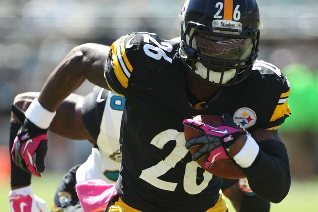 LeVeon Bell #26 of the Pittsburgh Steelers plays during an NFL football game between the Pittsburgh Steelers and the Jacksonville Jaguars, Sunday, Oct. 5, 2014, in Jacksonville, Fla. (Photo by Marc Serota/Panini)