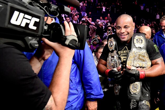 NEW YORK, NY - NOVEMBER 03:  Daniel Cormier of the United States walks out of the arena with his belts after winning the heavyweight title bout against Derrick Lewis of the United States during the UFC 230 event at Madison Square Garden on November 3, 2018 in New York City.  (Photo by Steven Ryan/Getty Images)