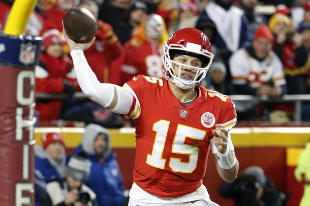 FILE - In this Dec. 30, 2018, file photo, Kansas City Chiefs quarterback Patrick Mahomes (15) throws a touchdown pass to wide receiver Demarcus Robinson, unseen, during the second half of an NFL football game against the Oakland Raiders, in Kansas City, Mo. Mahomes made The Associated Press 2018 NFL All-Pro Team, Friday, Jan. 4, 2018. (AP Photo/Charlie Riedel, File)