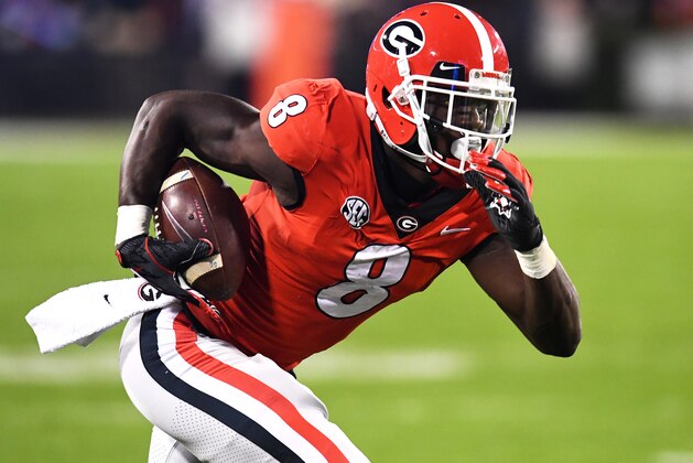 ATHENS, GA - NOVEMBER 10: Riley Ridley #8 of the Georgia Bulldogs runs with a catch against the Auburn Tigers on November 10, 2018 at Sanford Stadium in Athens, Georgia. (Photo by Scott Cunningham/Getty Images)