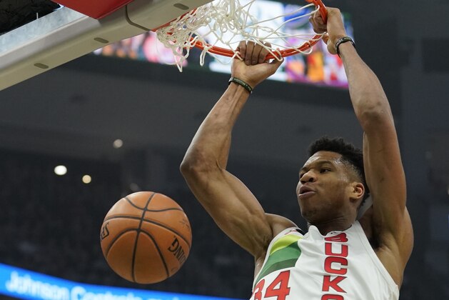 Milwaukee Bucks' Giannis Antetokounmpo dunks during the first half of an NBA basketball game against the Milwaukee Bucks Saturday, Dec. 29, 2018, in Milwaukee. (AP Photo/Morry Gash)