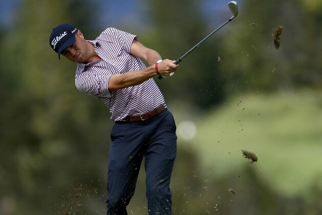 Justin Thomas hits from the fourth fairway during the second round of the Tournament of Champions golf event Friday, Jan. 4, 2019, at Kapalua Plantation Course in Kapalua, Hawaii. (AP Photo/Matt York)