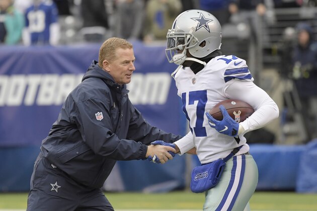 Dallas Cowboys head coach Jason Garrett, left, greets Allen Hurns before an NFL football game against the New York Giants, Sunday, Dec., 30, 2018, in East Rutherford, N.J. (AP Photo/Bill Kostroun)