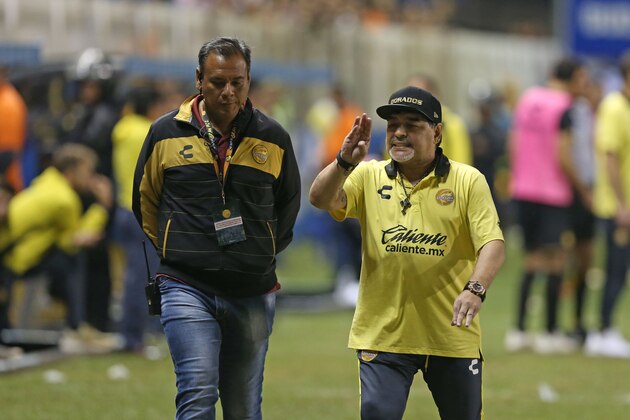 CULIACAN, MEXICO - NOVEMBER 29: Diego Armando Maradona coach of Dorados reacts during the final first leg match between Dorados de Sinalo and Atletico San Luis as part of the Torneo Apertura 2018 Ascenso MX at Banorte Stadium on November 29, 2018 in Culiacan, Mexico. (Photo by Refugio Ruiz/Getty Images) CULIACAN, MEXICO - NOVEMBER 29: Diego Armando Maradona coach of Dorados reacts during the final first leg match between Dorados de Sinalo and Atletico San Luis as part of the Torneo Apertura 2018 Ascenso MX at Banorte Stadium on November 29, 2018 in Culiacan, Mexico. (Photo by Refugio Ruiz/Getty Images)