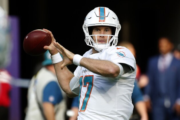 FILE - In this Dec. 16, 2018, file photo, Miami Dolphins quarterback Ryan Tannehill warms up before an NFL football game against the Minnesota Vikings, in Minneapolis. Tannehill, who became the Miami Dolphins’ starter in 2012 and has still never taken a postseason snap, may be about to play his final game for the franchise Sunday, Dec. 30. The Dolphins are wrapping up another disappointing season, and with Tannehill due a big raise this offseason, the team is expected to move on at quarterback. (AP Photo/Bruce Kluckhohn, File)