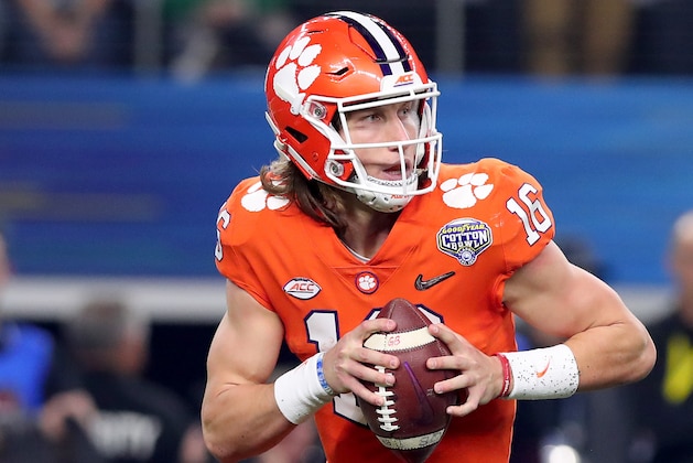 ARLINGTON, TEXAS - DECEMBER 29: Trevor Lawrence #16 of the Clemson Tigers scrambles with the ball in the first half against the Notre Dame Fighting Irish during the College Football Playoff Semifinal Goodyear Cotton Bowl Classic at AT&T Stadium on December 29, 2018 in Arlington, Texas. (Photo by Tom Pennington/Getty Images)