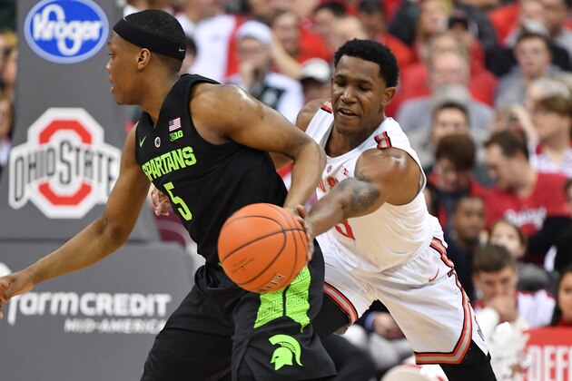 COLUMBUS, OH - JANUARY 5:  C.J. Jackson #3 of the Ohio State Buckeyes pokes the ball away from Cassius Winston #5 of the Michigan State Spartans in the first half on January 5, 2019 at Value City Arena in Columbus, Ohio.  (Photo by Jamie Sabau/Getty Images)