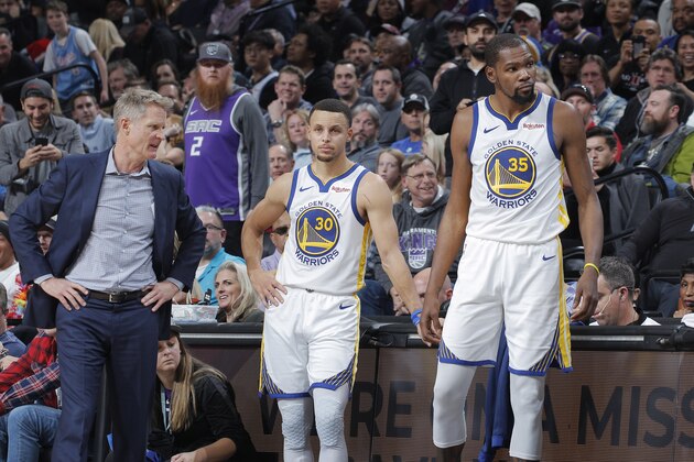 SACRAMENTO, CA - DECEMBER 14: Head Coach Steve Kerr of the Golden State Warriors coaches Stephen Curry #30 and Kevin Durant #35 against the Sacramento Kings on December 14, 2018 at Golden 1 Center in Sacramento, California. NOTE TO USER: User expressly acknowledges and agrees that, by downloading and or using this photograph, User is consenting to the terms and conditions of the Getty Images Agreement. Mandatory Copyright Notice: Copyright 2018 NBAE (Photo by Rocky Widner/NBAE via Getty Images)