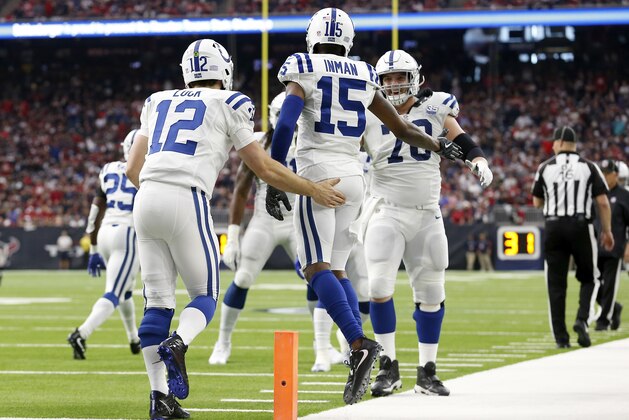 HOUSTON, TX - JANUARY 05: Andrew Luck #12 of the Indianapolis Colts congratulates Dontrelle Inman #15 after a second quarter touchdown during the Wild Card Round at NRG Stadium on January 5, 2019 in Houston, Texas. (Photo by Tim Warner/Getty Images) HOUSTON, TX - JANUARY 05: Andrew Luck #12 of the Indianapolis Colts congratulates Dontrelle Inman #15 after a second quarter touchdown during the Wild Card Round at NRG Stadium on January 5, 2019 in Houston, Texas. (Photo by Tim Warner/Getty Images)