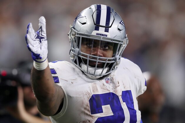 ARLINGTON, TEXAS - JANUARY 05: Ezekiel Elliott #21 of the Dallas Cowboys gestures for a first down in the second quarter against the  Seattle Seahawks during the Wild Card Round at AT&T Stadium on January 05, 2019 in Arlington, Texas. (Photo by Tom Pennington/Getty Images)