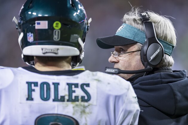 LANDOVER, MD - DECEMBER 30: Head coach Doug Pederson of the Philadelphia Eagles speaks with Nick Foles #9 during a break in the action in the first half against the Washington Redskins at FedExField on December 30, 2018 in Landover, Maryland. (Photo by Scott Taetsch/Getty Images)