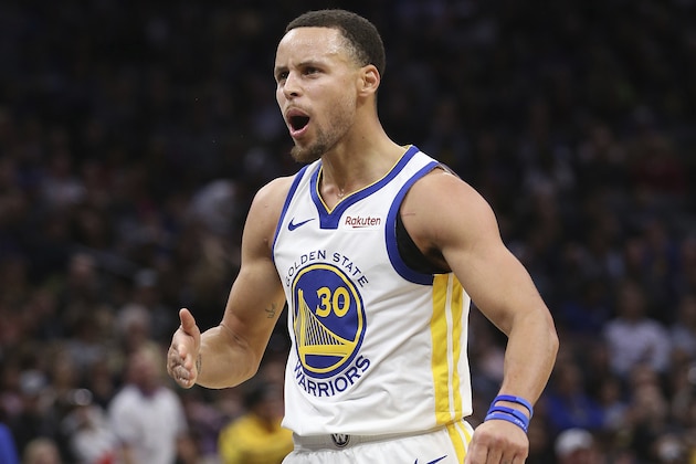 Golden State Warriors guard Stephen Curry reacts after scoring a 3-point basket during the second half of an NBA basketball game against the Sacramento Kings, Saturday, Jan. 5, 2019, in Sacramento, Calif. The Warriors won 127-123. (AP Photo/Rich Pedroncelli)