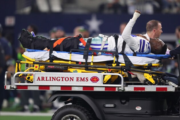 ARLINGTON, TEXAS - JANUARY 05: Allen Hurns #17 of the Dallas Cowboys raides his fist as he is transported off the field after being injured in the first quarter during the Wild Card Round against the Seattle Seahawks at AT&T Stadium on January 05, 2019 in Arlington, Texas. (Photo by Tom Pennington/Getty Images)