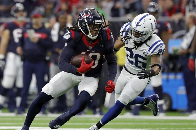 HOUSTON, TX - JANUARY 05: DeAndre Hopkins #10 of the Houston Texans runs after a catch defended by Clayton Geathers #26 of the Indianapolis Colts in the second half during the Wild Card Round at NRG Stadium on January 5, 2019 in Houston, Texas. (Photo by Tim Warner/Getty Images) HOUSTON, TX - JANUARY 05: DeAndre Hopkins #10 of the Houston Texans runs after a catch defended by Clayton Geathers #26 of the Indianapolis Colts in the second half during the Wild Card Round at NRG Stadium on January 5, 2019 in Houston, Texas. (Photo by Tim Warner/Getty Images)