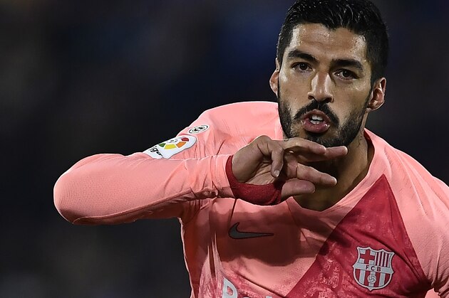 Barcelona's Uruguayan forward Luis Suarez celebrates scoring their second goal during the Spanish League football match between Getafe CF and FC Barcelona at the Col. Alfonso Perez stadium in Getafe on January 6, 2019. (Photo by OSCAR DEL POZO / AFP)        (Photo credit should read OSCAR DEL POZO/AFP/Getty Images)