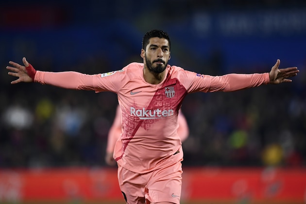 Barcelona's Uruguayan forward Luis Suarez celebrates scoring their second goal during the Spanish League football match between Getafe CF and FC Barcelona at the Col. Alfonso Perez stadium in Getafe on January 6, 2019. (Photo by OSCAR DEL POZO / AFP)        (Photo credit should read OSCAR DEL POZO/AFP/Getty Images)