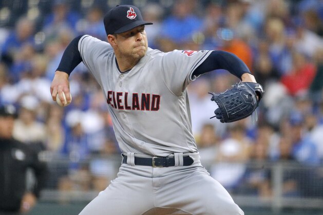 Cleveland Indians starting pitcher Corey Kluber throws during the first inning of a baseball game against the Kansas City Royals on Saturday, Sept. 29, 2018, in Kansas City, Mo. (AP Photo/Charlie Riedel)