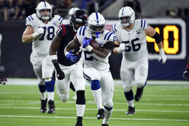 Indianapolis Colts running back Marlon Mack (25) runs against the Houston Texans during the second half of an NFL wild card playoff football game, Saturday, Jan. 5, 2019, in Houston. (AP Photo/Eric Christian Smith)