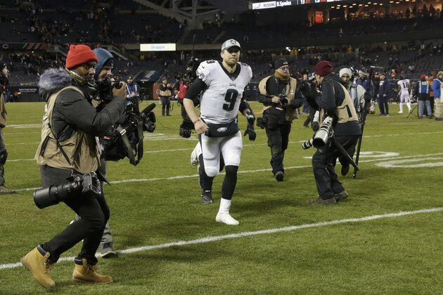 Philadelphia Eagles quarterback Nick Foles (9) runs off the field after an NFL wild-card playoff football game against the Chicago Bears Sunday, Jan. 6, 2019, in Chicago. The Eagles won 16-15. (AP Photo/David Banks)