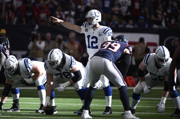 Indianapolis Colts quarterback Andrew Luck (12) signals during the first half of an NFL wild card playoff football game against the Houston Texans, Saturday, Jan. 5, 2019, in Houston. (AP Photo/Eric Christian Smith)