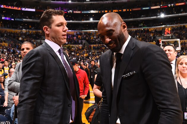 LOS ANGELES, CA - DECEMBER 18: Head Coach Luke Walton of the Los Angeles Lakers and Kobe Bryant greet after the jersey retirement ceremony on December 18, 2017 at STAPLES Center in Los Angeles, California. NOTE TO USER: User expressly acknowledges and agrees that, by downloading and/or using this Photograph, user is consenting to the terms and conditions of the Getty Images License Agreement. Mandatory Copyright Notice: Copyright 2017 NBAE (Photo by Andrew D. Bernstein/NBAE via Getty Images)