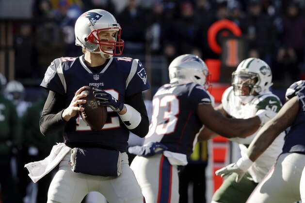 New England Patriots quarterback Tom Brady passes under pressure from the New York Jets during the first half of an NFL football game, Sunday, Dec. 30, 2018, in Foxborough, Mass. (AP Photo/Charles Krupa)