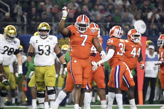 Clemson defensive end Austin Bryant (7) celebrates a stop again Notre Dame during the NCAA Cotton Bowl semi-final playoff football game, Saturday, Dec. 29, 2018, in Arlington, Texas. (AP Photo/ Jeffrey McWhorter) Clemson defensive end Austin Bryant (7) celebrates a stop again Notre Dame during the NCAA Cotton Bowl semi-final playoff football game, Saturday, Dec. 29, 2018, in Arlington, Texas. (AP Photo/ Jeffrey McWhorter)
